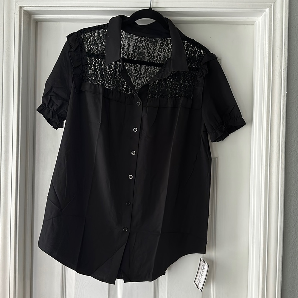 Women’s black blouse with lace pattern